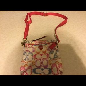 A rainbow coach Purse